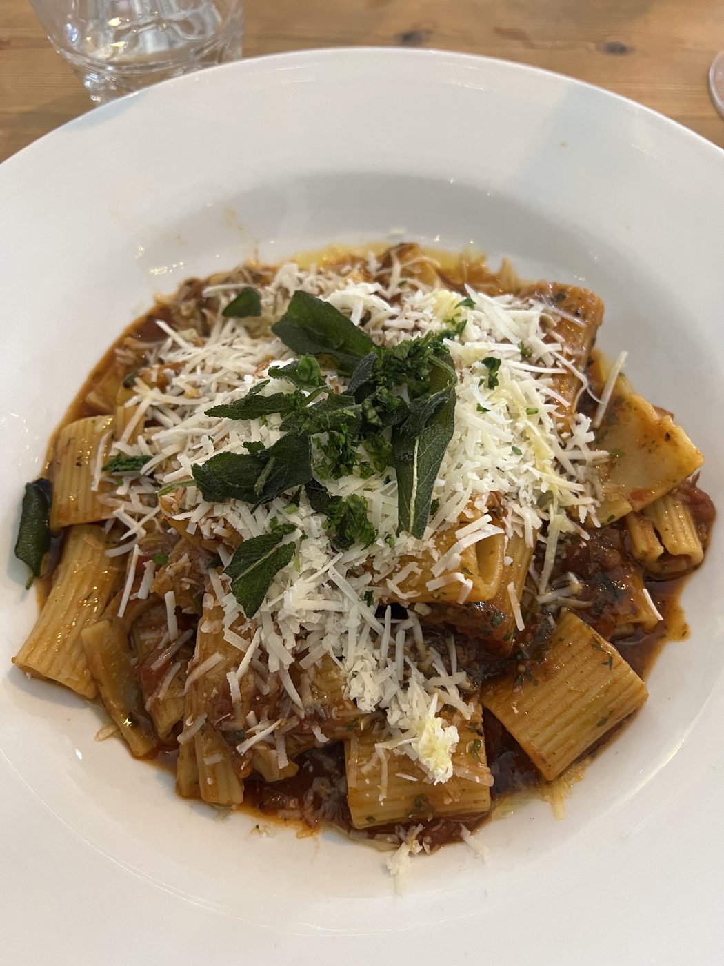 Rigatoni with ragù and grated cheese